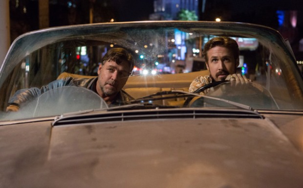 This image released by Warner Bros. Entertainment shows Ryan Gosling, right, and Russell Crowe in a scene from "The Nice Guys." (Daniel McFadden/Warner Bros. Entertainment via AP) ORG XMIT: NYET943